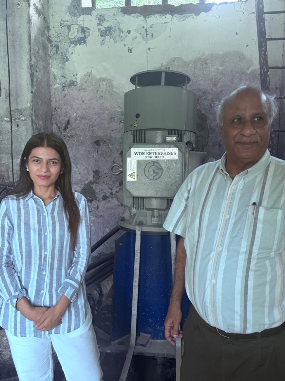 SURA Group leadership beside a pump motor supplied and installed by Avon Enterprises, New Delhi