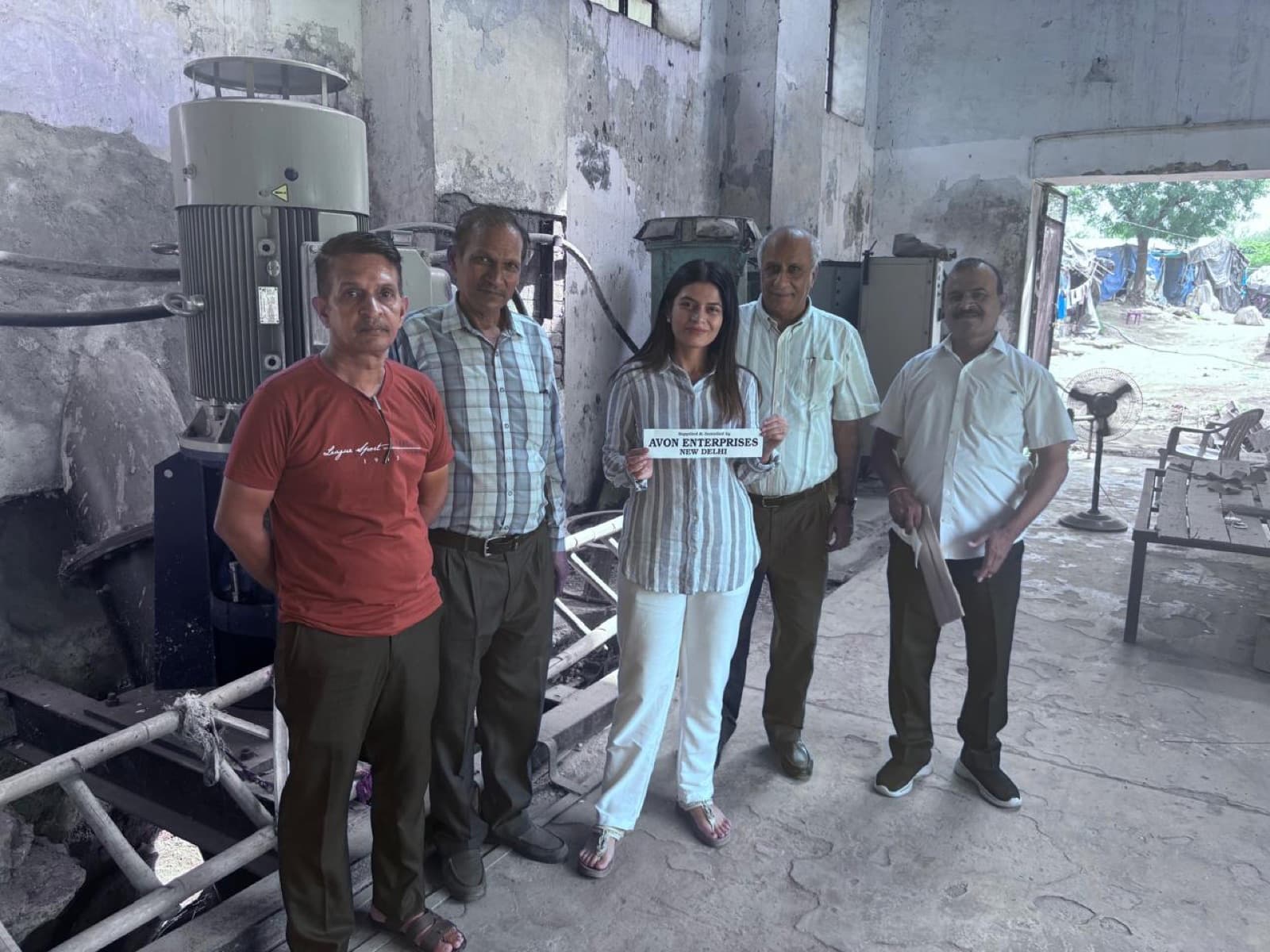 SURA Group engineers and leadership at a water infrastructure pump house
